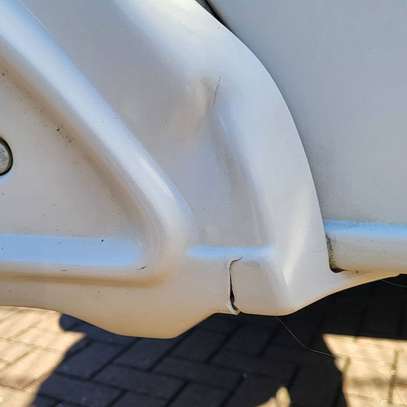 Caravan dent repair showing dent in caravan