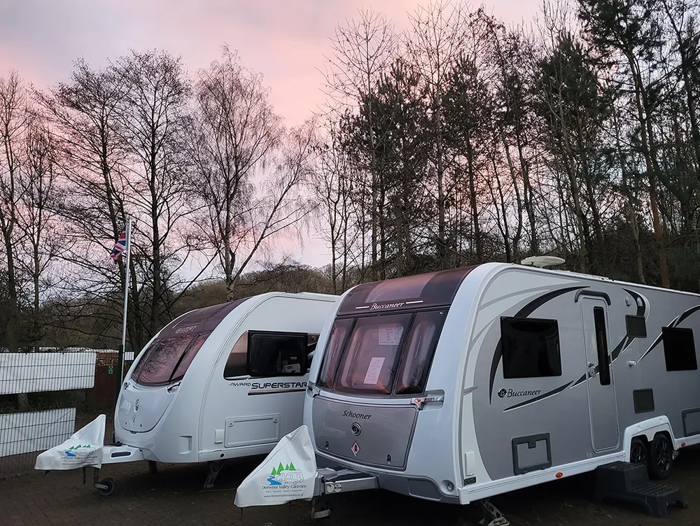 Beautiful picture of two caravans for sale in Tyne and Wear during a sunset